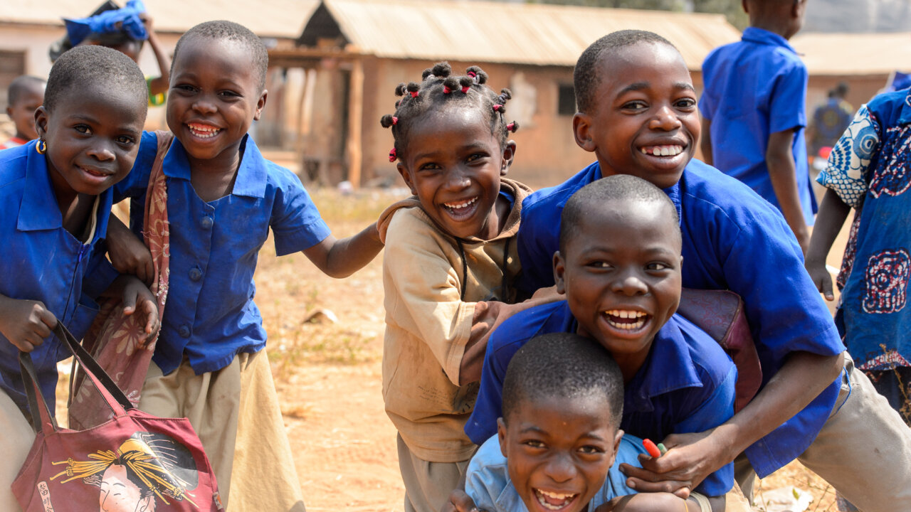 Image of Young African Girl holding signing titled hope